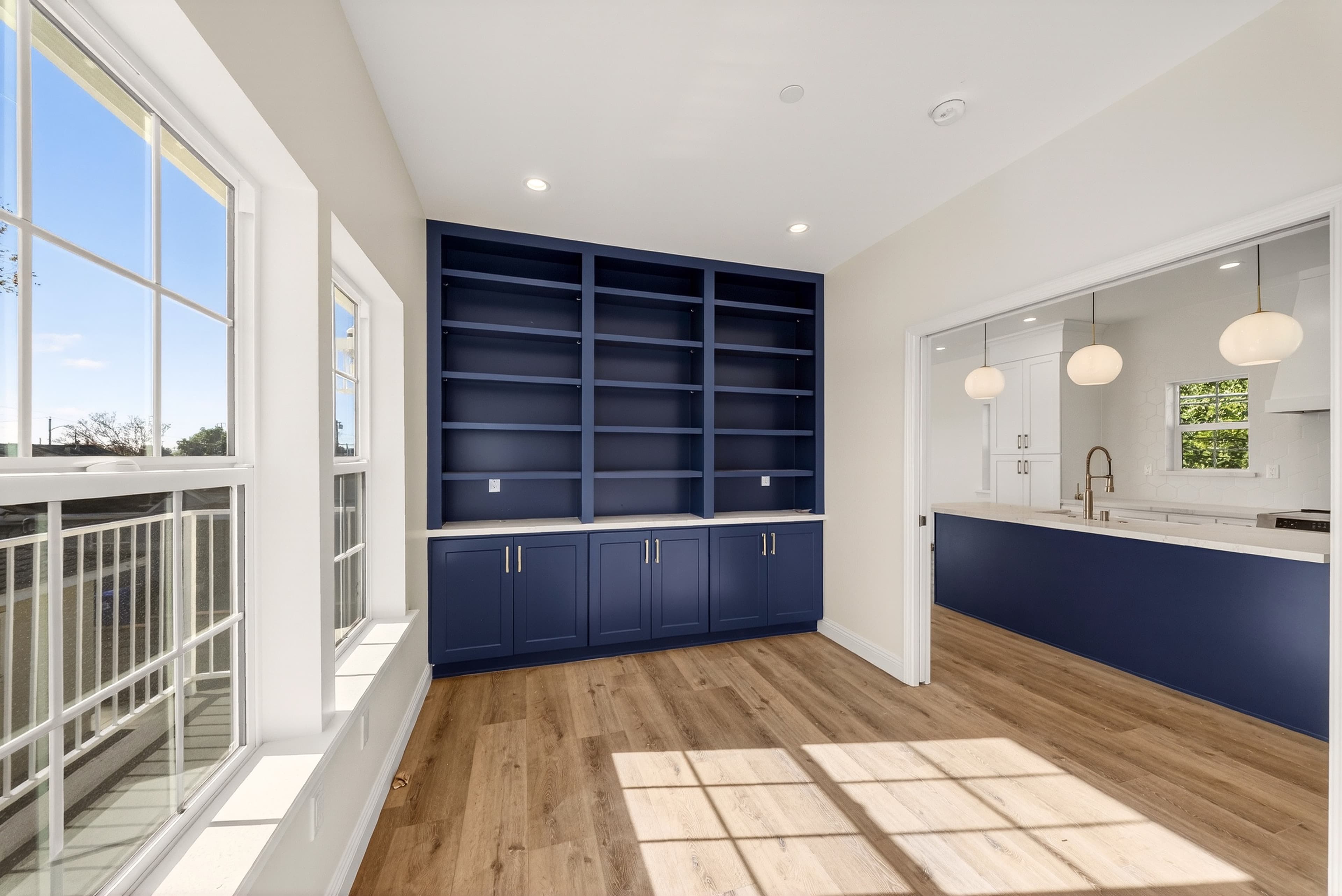 Built-in shelving in a sunlit living area